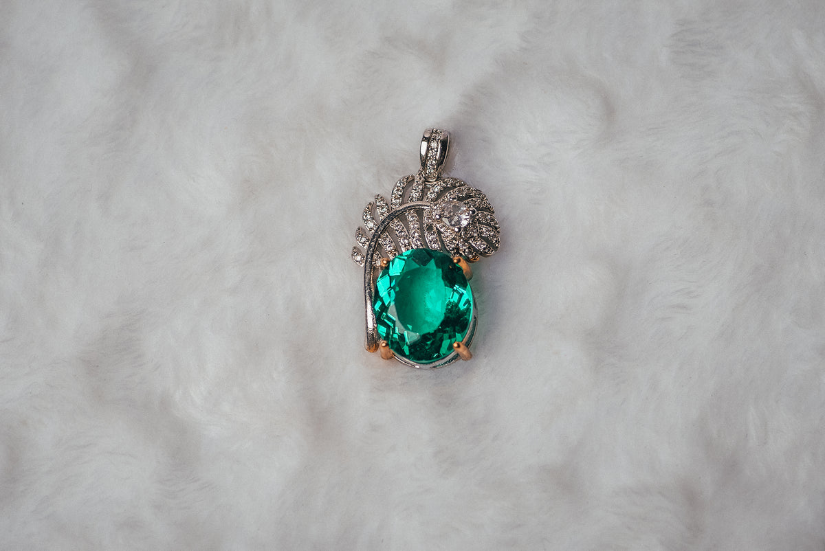Emerald Feather Crest Pendant