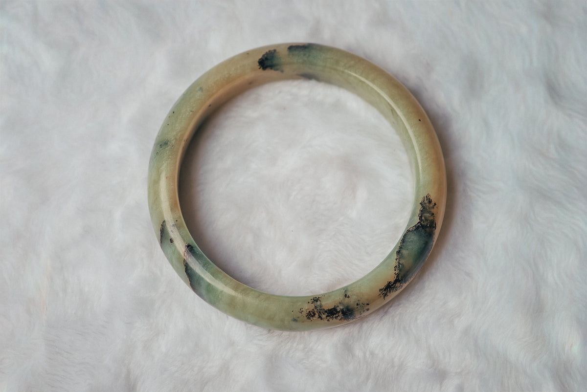 Two-Toned Yellow Xiuyan Jade Bangle