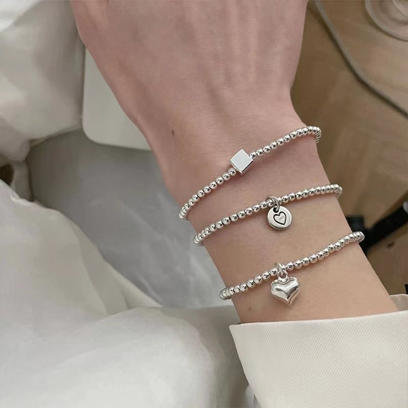 Women silver heart and bear bracelet