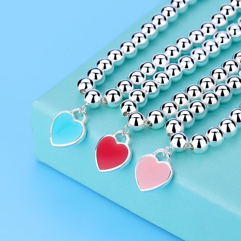 Women silver bead bracelet red heart