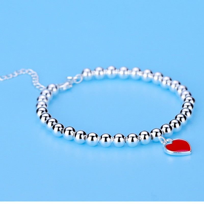 Women silver bead bracelet red heart