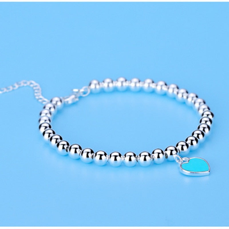Women silver bead bracelet blue heart