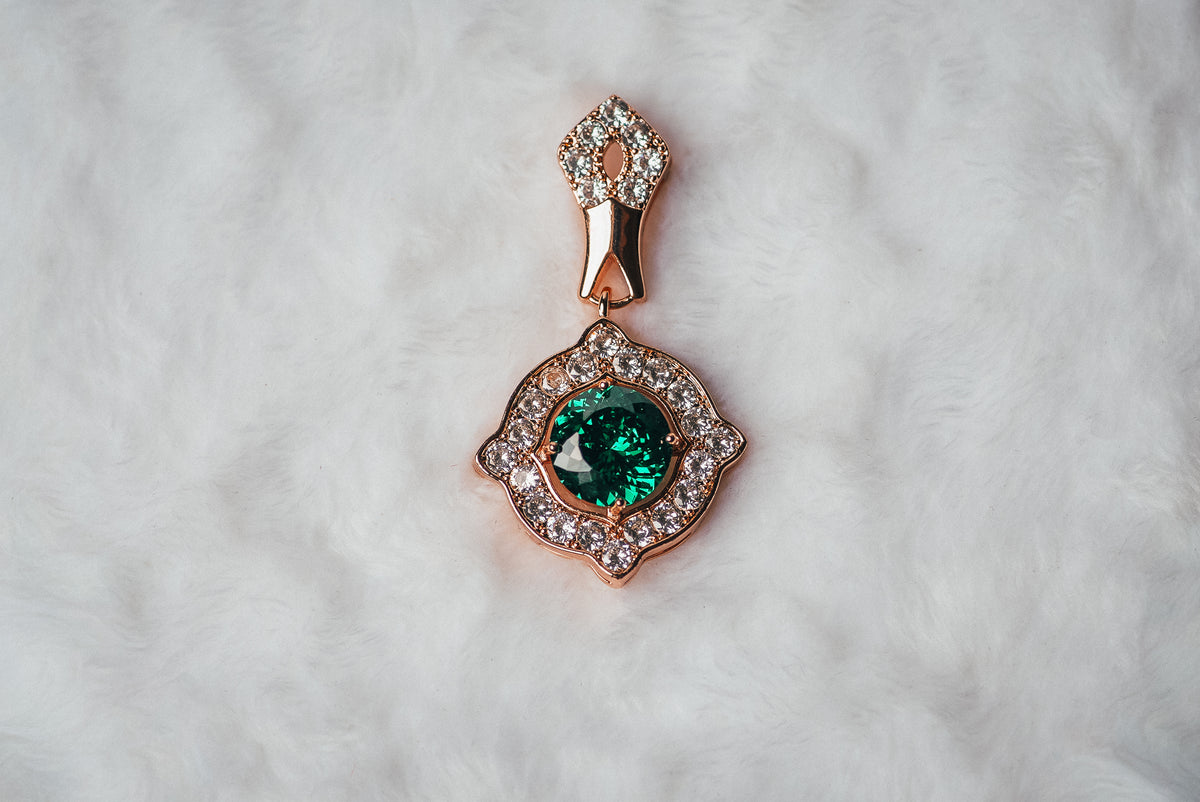 Gold & Emerald Starburst Pendant