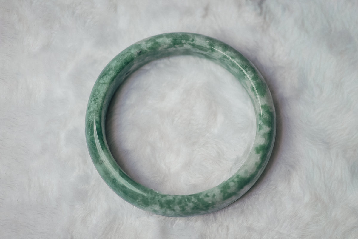 Two-Tone Green and White Xiuyan Jade Bangle