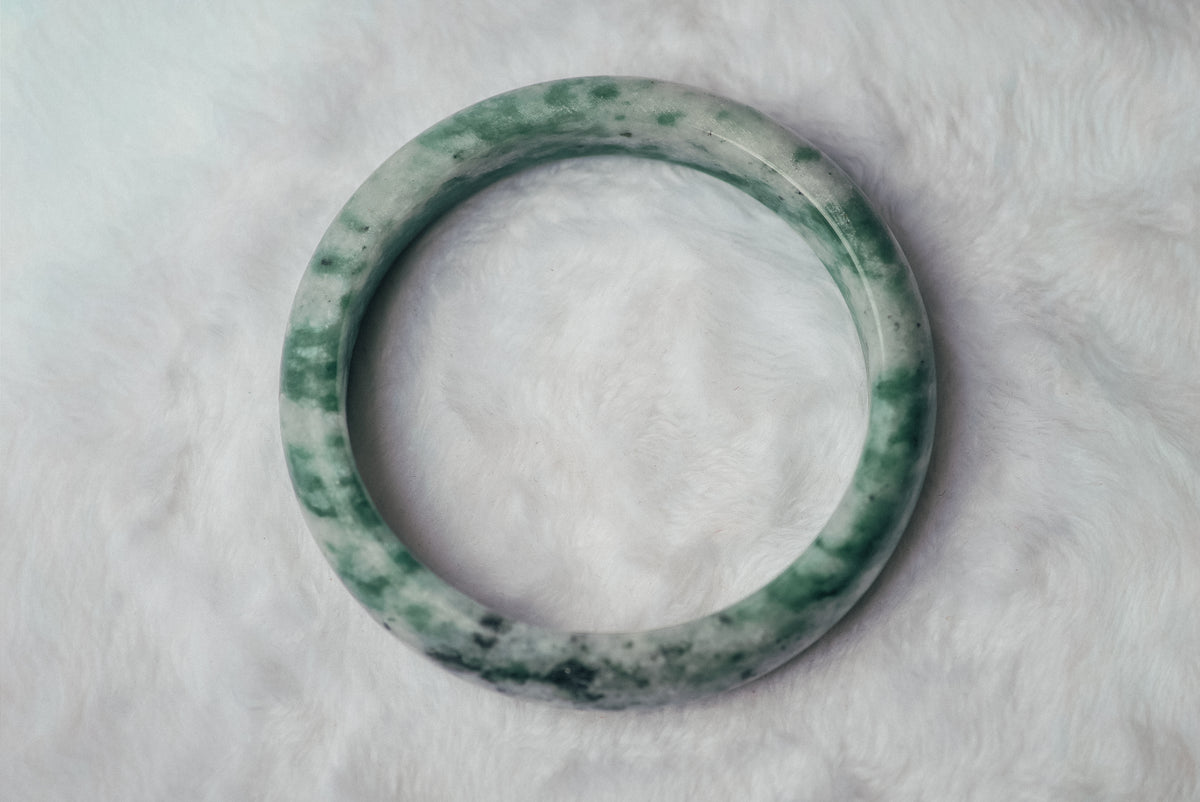 Two-Tone Green and White Xiuyan Jade Bangle